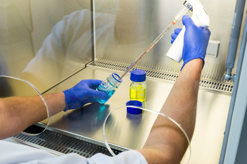 Working under a workbench in an laboratory