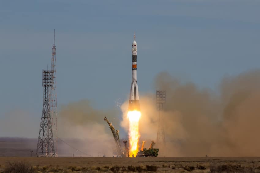 A rocket launching into space for scientists to work in laboratories in space 