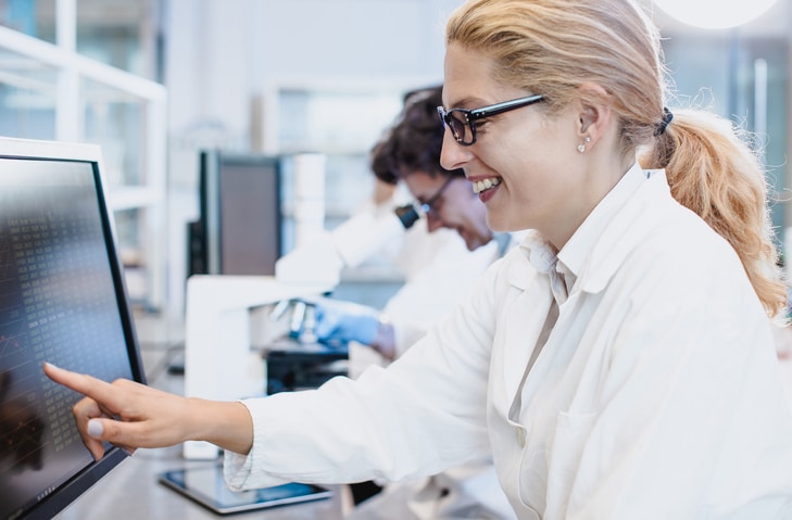 scientist working on computer