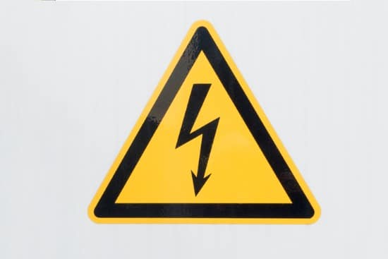 high voltage sign on grey background