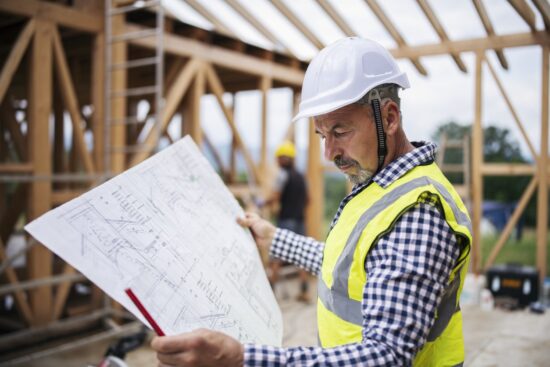 architect looking at plans